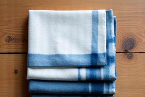 Set of four indigo shibori cotton napkins with varying patterns