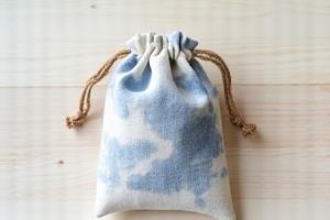Small indigo shibori cotton pouch with a geometric pattern